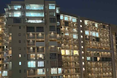 building-night-view-naman-habitat-shree-naman-group-andheri-west-mumbai-maharashtra-set-3